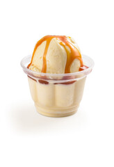 Refreshing vanilla ice cream with caramel topping served on a transparent bowl