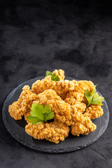Breaded chicken strips. Chicken fingers.