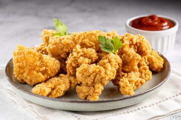 Breaded chicken strips. Chicken fingers.