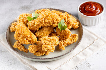 Breaded chicken strips. Chicken fingers.