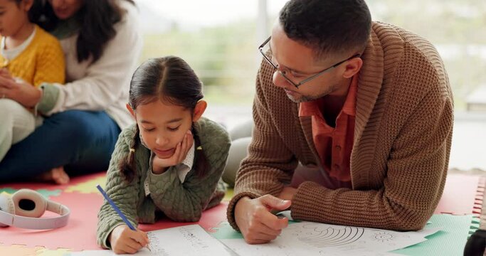 Girl kid, dad and homework on floor, writing or helping hand for for education, teaching and support. Parents, young children and together with kindness, learning and care for studying in family home