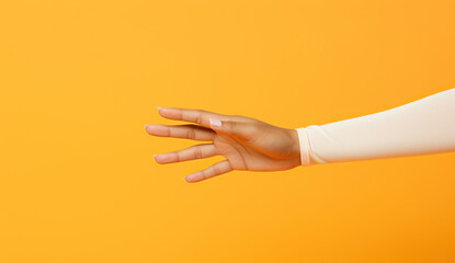 hand of the person, gesture on the yellow background 
hand of the person, gesture on the yellow background
