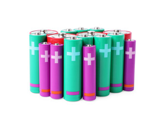 Many different new batteries isolated on white