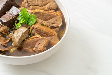 Pot-stewed ducks or Steamed duck with soy sauce and spices