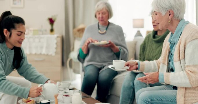 Tea, senior women or friends at a retirement home for breakfast, chat and relax. Elderly people or group with a caregiver at a table for food and social visit while drinking and eating together