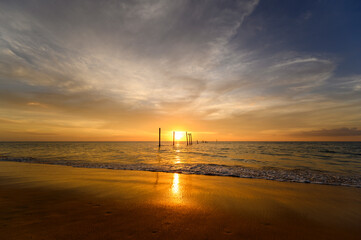 Fototapeta premium nature landscape sea waves sunset sandy beach evening light