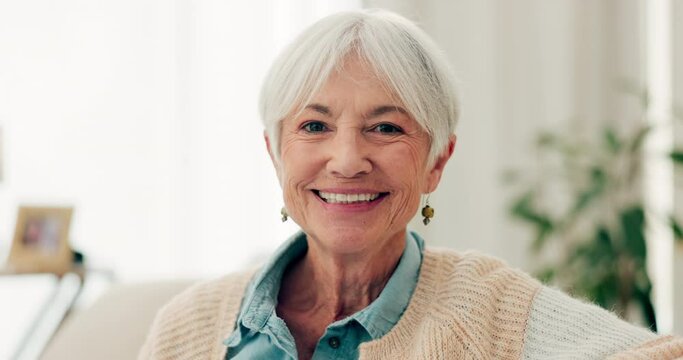 Happy, face and senior woman on sofa in nursing home or grandma with happiness or freedom in retirement to relax in house. Portrait, elderly person and smile in living room or thinking of good memory