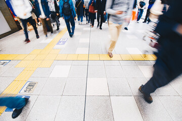 Blurred passenger people walking in Osaka railway station