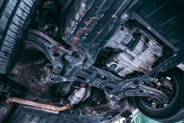 bottom view of the car All parts display Maintenance inspection service is used for vehicle engine...