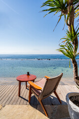 Empty beach chair with tropical beach and sea view, Summer vacation and Travel concept