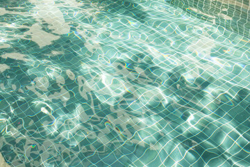 Water surface with waves on water surface wave effect You can see the blue square tiles at the bottom of the pool.
