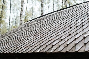 Medieval house roof made of wooden tiles, exterior