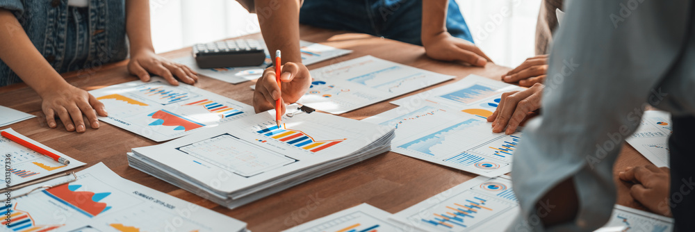 Leinwandbilder analyst team utilizing bi fintech to analyze and pointing at financial dashboard paper office. busin