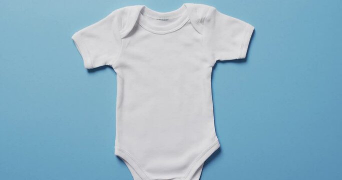 Video of whit baby grow with copy space on blue background