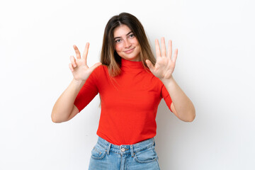 Fototapeta na wymiar Young caucasian woman isolated on white background counting eight with fingers