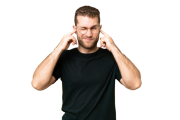 Young handsome blonde man over isolated chroma key background frustrated and covering ears