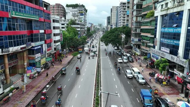 Aerial view of Dhaka city, the vibrant and bustling capital of Bangladesh. The cosmopolitan city is a blend of modern and traditional, with towering skyscrapers, bustling markets. 4k