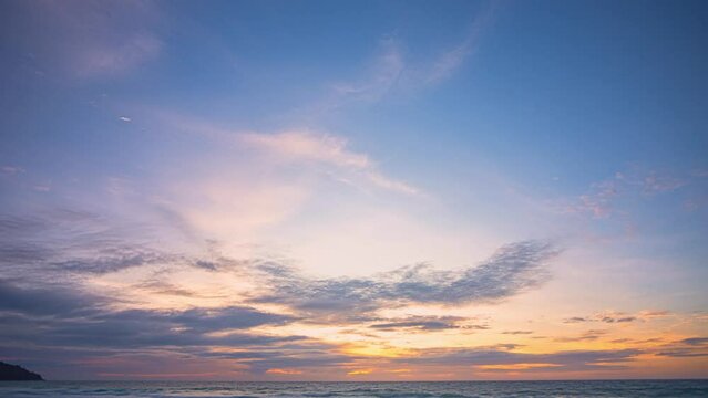 .Time lapse bright colorful clouds in amazing sky at sunset above the sea. .As the day winds down, the clouds become a canvas of vibrant hues, .a beautiful reminder of the days passing. sky texture.