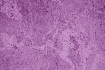 The surface of a concrete wall. Texture background. Purple shade.