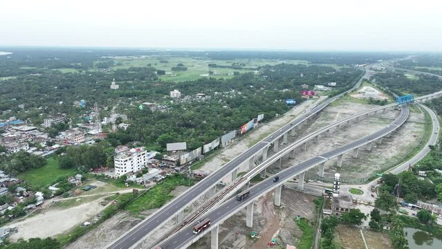 Aerial view of The Padma Multipurpose Bridge, the largest bridge, over the Padma river by day in perspective, Mawa, Munshiganj, Bangladesh.. 4k