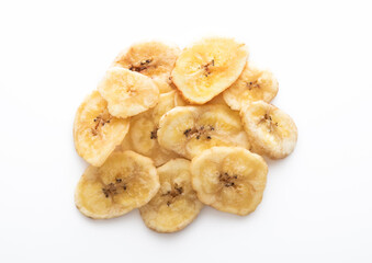Dried dehydrated banana chips isolated on white background.Macro
