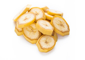 Naklejka na ściany i meble Fresh raw organic banana slices with yellow skin on white background.