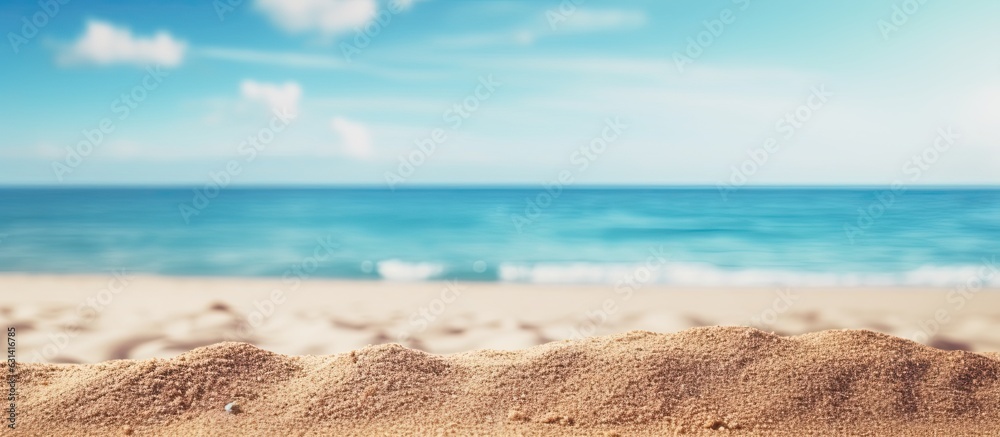 Aufkleber close-up shot of sand with a blurred background of the sea and sky on a summer day. suitable for