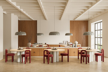 White and wooden restaurant interior with round tables