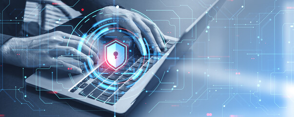 Man hands with laptop, data protection shield icon