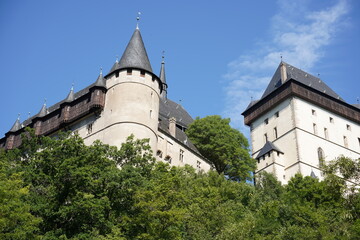 Fototapeta na wymiar Karlstejn medieval gothic royal Castle in Central Bohemia. Karlstejn castle - popular tourist attraction near Prague. Czech Republic