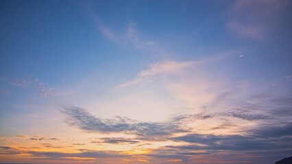 .time lapse wonderful The rays of the sun shine through the clouds above .The rays of the sun shine through the clouds at beautiful sunset..Majestic landscape. sky texture..