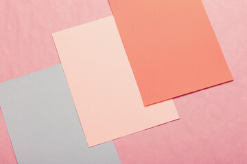 multi-colored paper background from several sheets of cardboard