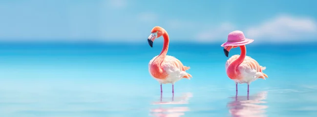 Foto auf Acrylglas Travel and resort banner with funny pink flamingos standing in clear blue sea with clear sunny sky. Concept of summer vacation, traveling and resting on sea resort. Banner size,  copy space © KRISTINA KUPTSEVICH