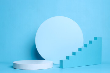 Creative trending composition with white podium, round circle board and stairs on pastel blue background. 