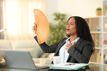 Black freelancer tele working suffering heat stroke