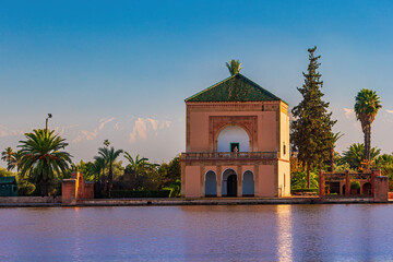 Saadian Pavillon at Menara gardens with Atlas mountains in Marrakech, Morocco