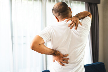 Man has problem with structural posture back Neck and shoulder pain. Massaged his neck and...