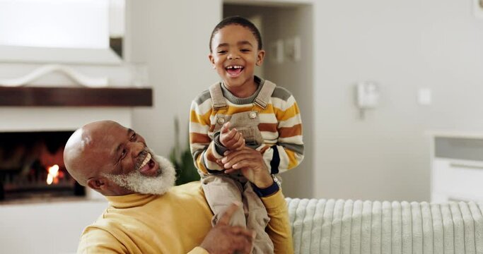 Playing, grandfather and kid laughing on sofa for bonding, relationship and relax in living room. Happy family, African and grandpa with boy at home having fun on couch for embrace, cuddle and love