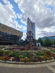 photo of the Fontain with the mdr building in the background in Leipzig - Germany