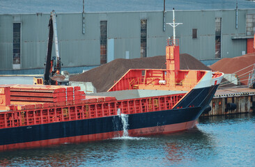 Ballast operations on board the cargo ship in the port. Ballast waters treatment system and...
