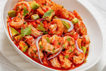mexican shrimp cocktail salad in a bowl, top view