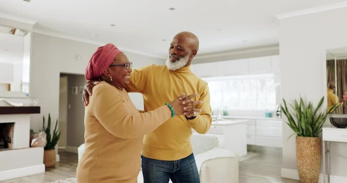 Senior African couple, dance and home in living room with romance, celebration and comic bonding. Elderly black woman, man and happy for dancing, moving and steps with love in lounge at apartment