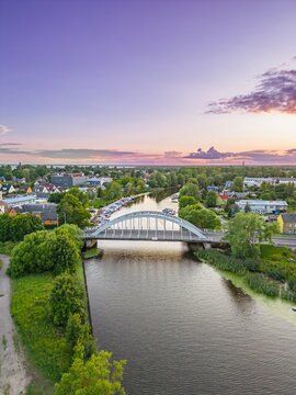 Summer Aerial View of Parnu J&otilde;gi River, Estonia at sunset. Vertical shot, portrait shot.