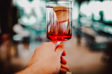 man hand hold glass Fresh cold cocktail