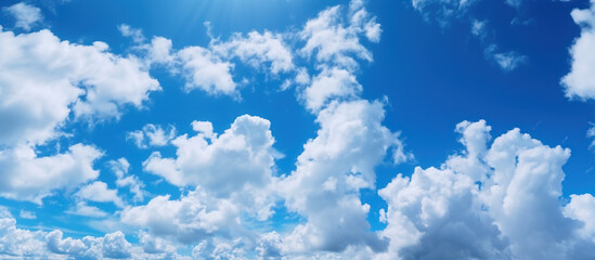 Obraz na płótnie Canvas Clear blue sky and white clouds