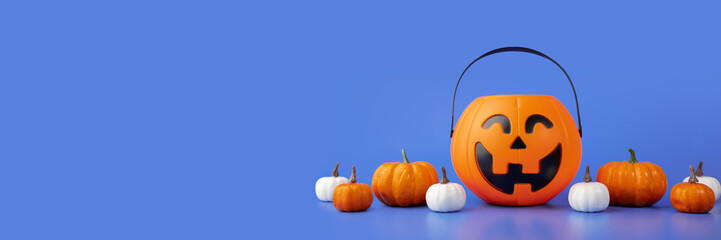 halloween banner, halloween pumpkins on a blue background, copy space