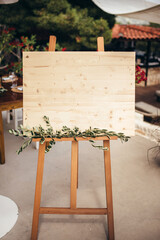 Wooden easel with a board