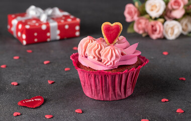 Cupcake Red velvet decorated heart cookie, and gift on gray background