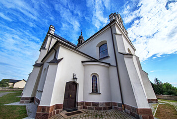 General view and close-up of architectural details of the St. Stanislaus Catholic Church built in 1905 in Sieluń, Masovia, Poland.