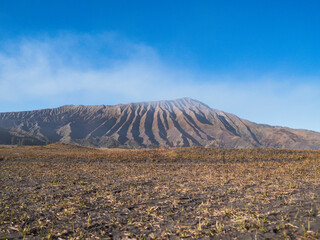 Landscape view of Pasir Berbisik and Bromo Mountain in Indonesia.